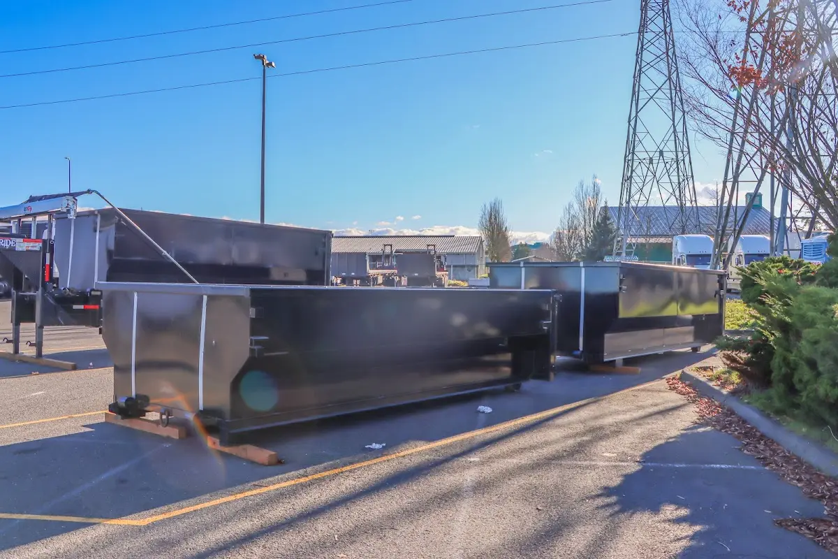 Roll-off dumpster ready for waste disposal at job site for 15 Yard Dumpster Rental in Tipton